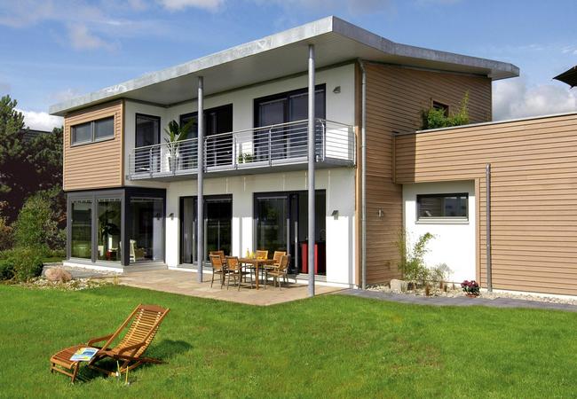 una casa con terraza en la azotea