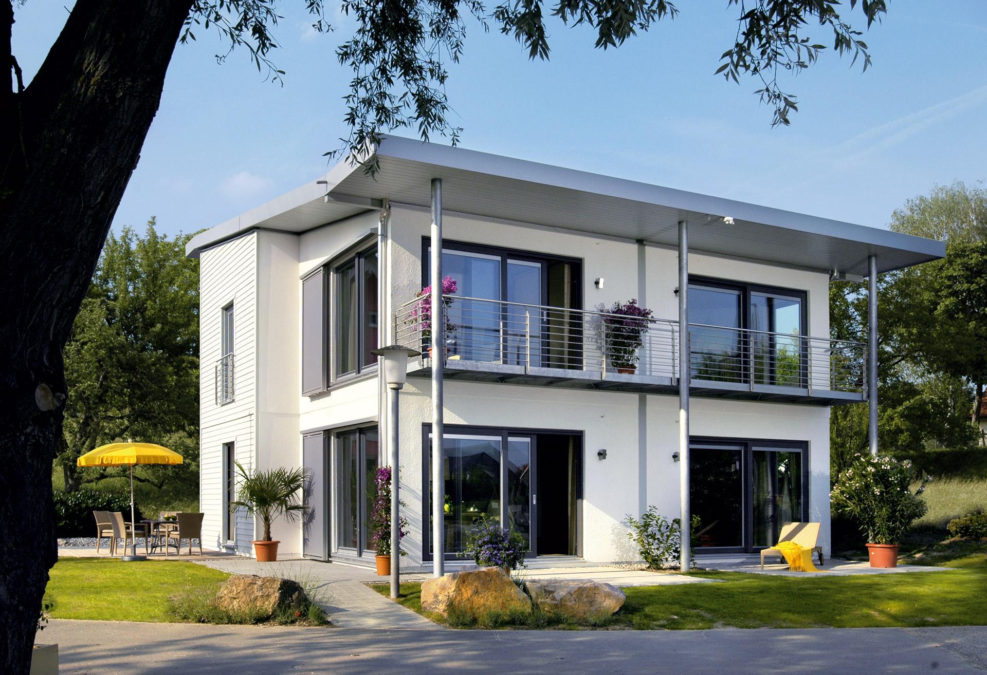 [Translate to Français:] Modernes Einfamilienhaus mit Z-Dach