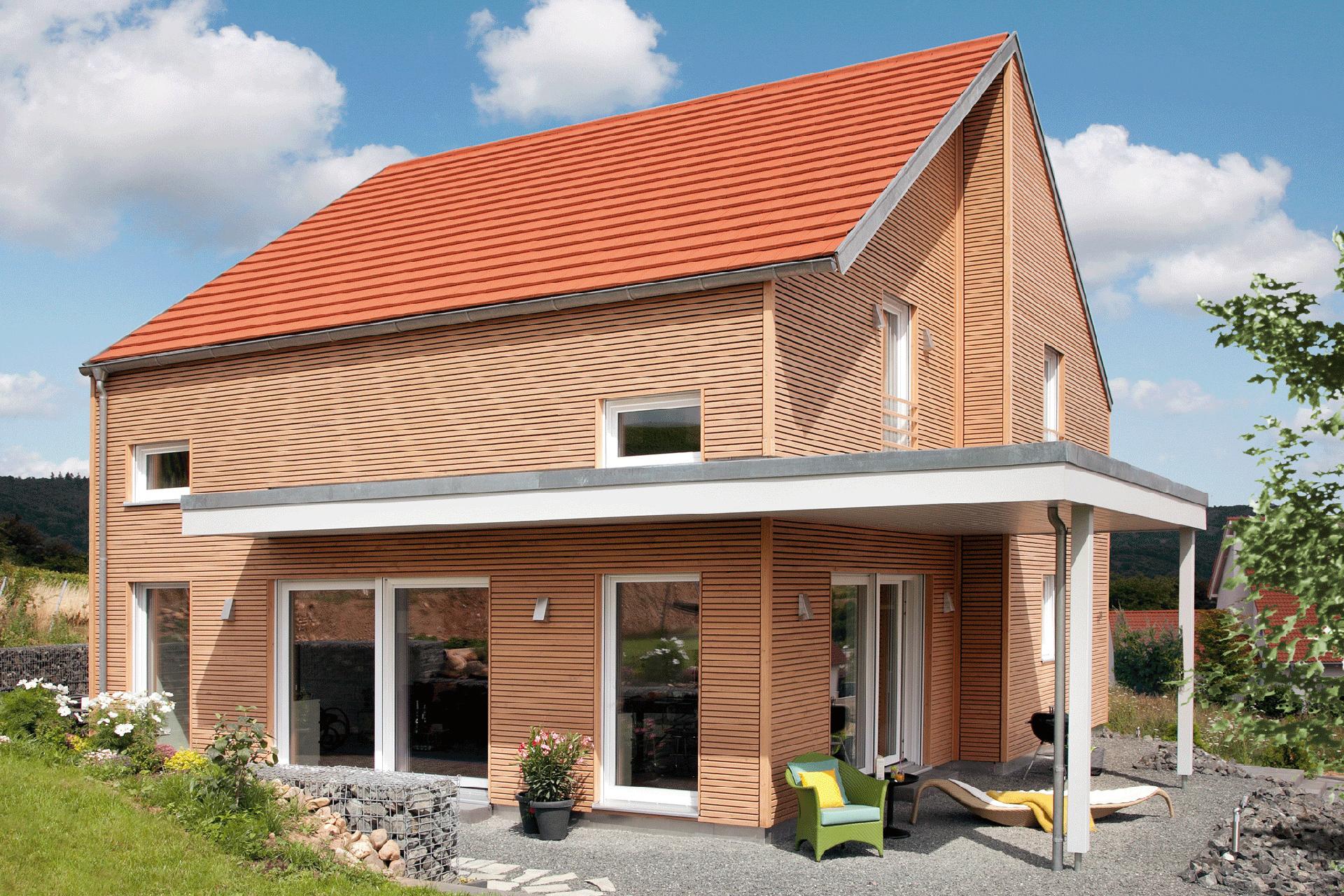 Detached house with wooden façade in Bauhaus style