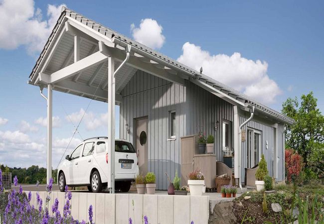 Carport an FlyingSpace mit Holzfassade