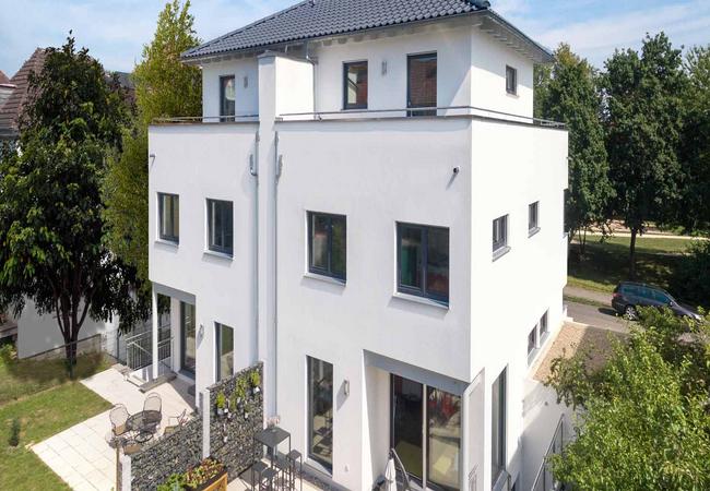 Dreigeschössiges Doppelhaus mit Dachterasse